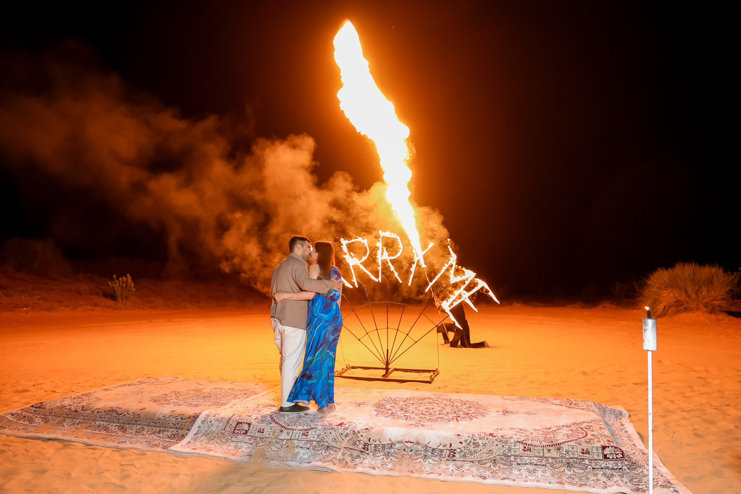 nujum.ae-proposaldubai.com-experiencesandevents.com-desert-safari-proposal-camel-ride-fire-show-desertsafari-DE