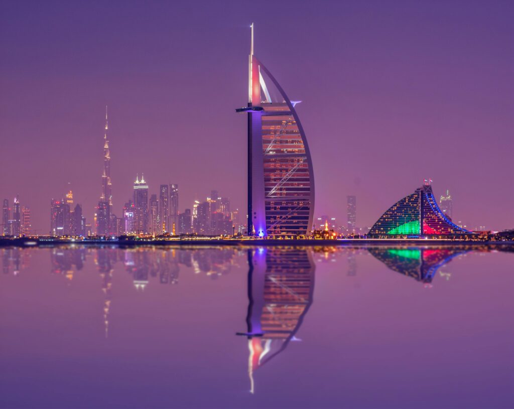 pexels-photo-3680912-3680912 Captivating night scene showcasing Burj Al Arab and Dubai skyline reflections.