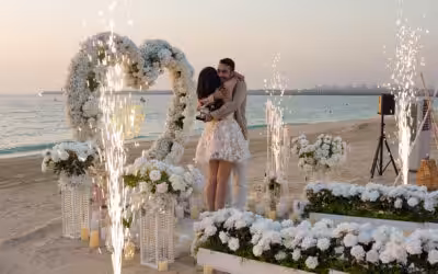 Luxury heart flower with fireworks frame at beach proposal in dubai