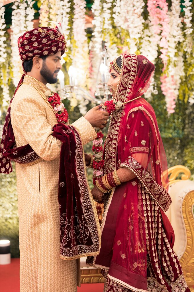 A captivating portrait of a South Asian couple in traditional wedding attire, capturing a beautiful moment.