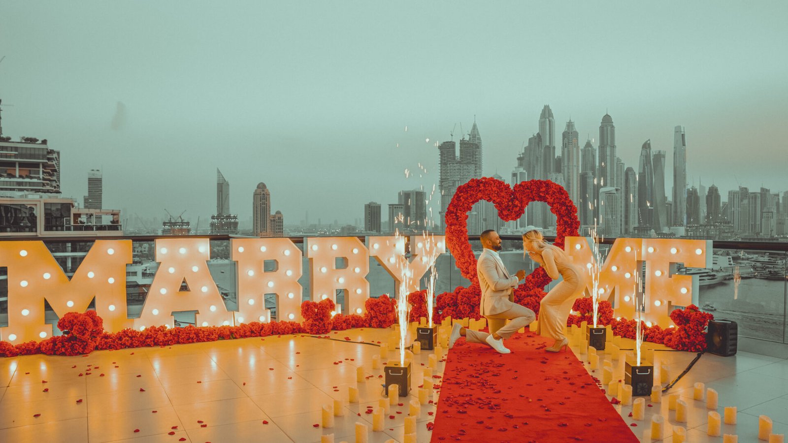 Private Rooftop Terrace Facing Dubai Marina Skyline at Sunset - luxury proposal by Proposal Dubai